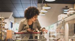 shopper at deli counter in a grocery store