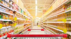 grocery cart rolling down an aisle in a grocery store