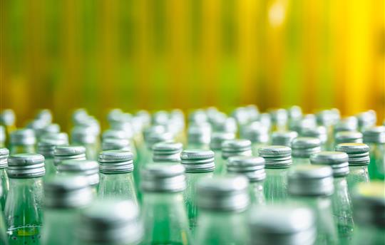 beverage bottles on orange background