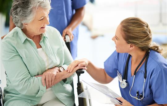 Doctor, documents and discussion with senior woman in hospital, medical results or treatment